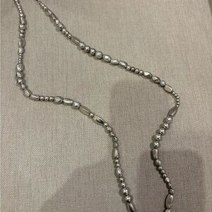 New with tags.  Chico's Silver Beaded Necklace